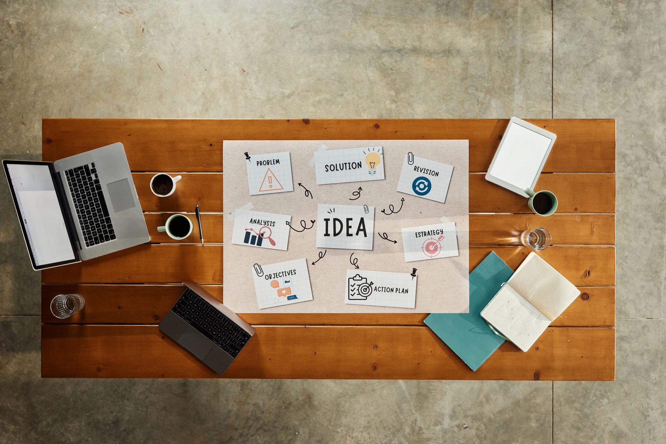 Workspace with planning materials and business documents